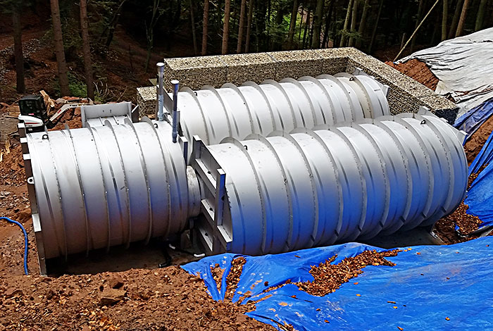 Two pipe tanks with connecting shaft
