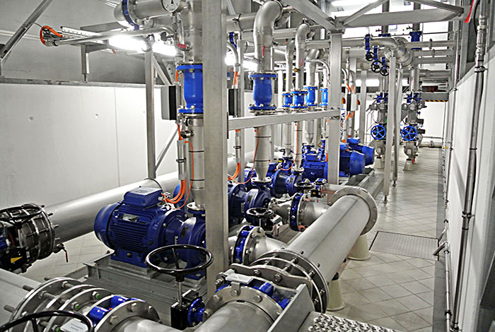 Pressure boosting systems with horizontal pumps