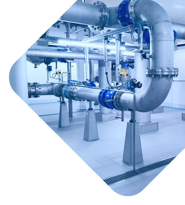 Stainless steel piping on conical pipe supports in an industrial hall within a diamond-shaped design crop.